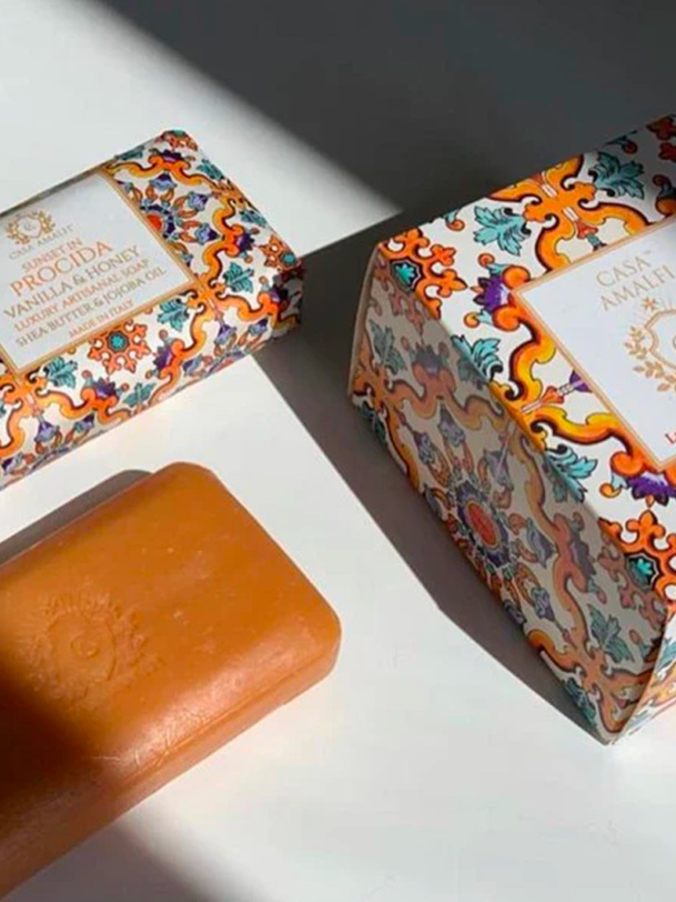 savon sunset in procida - casa amalfi orange