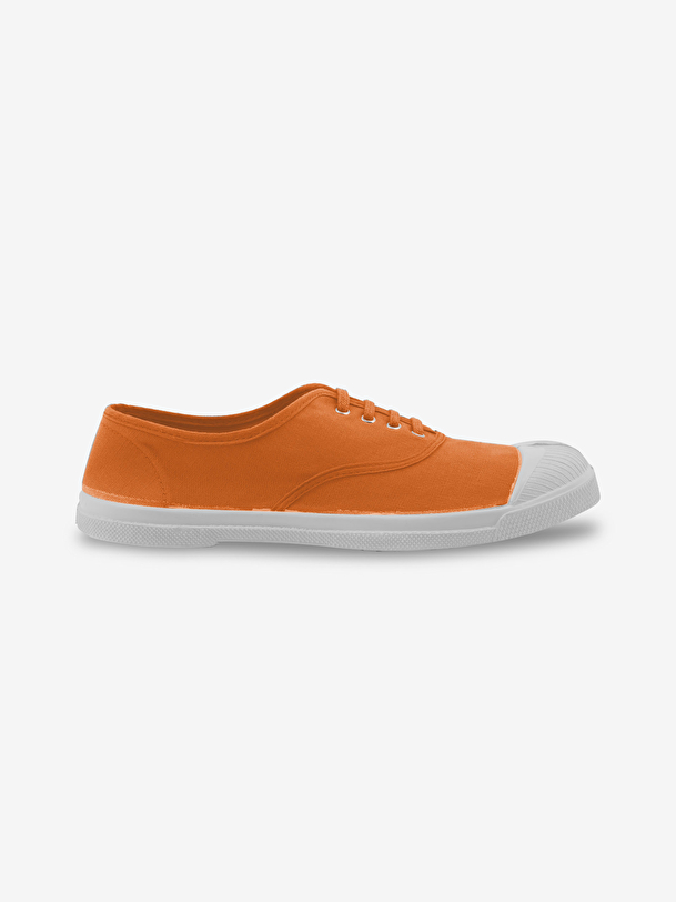 woman lace-up tennis coral