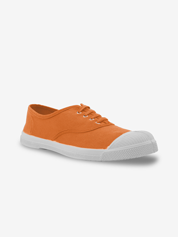 woman lace-up tennis coral