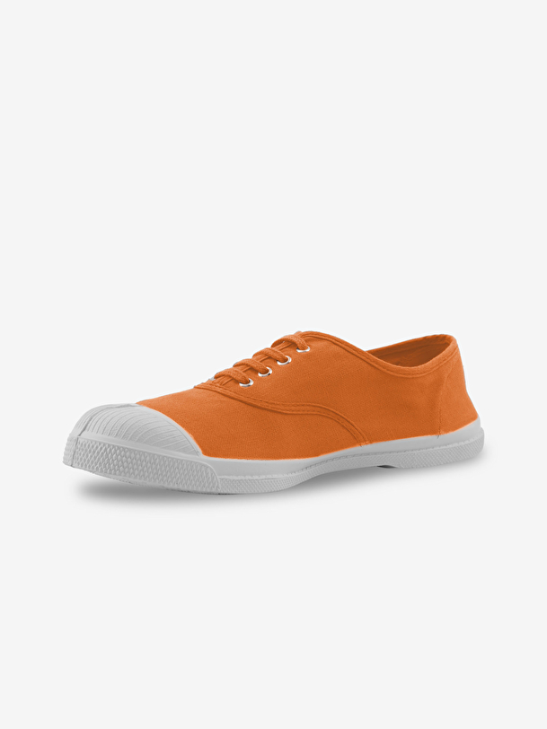 woman lace-up tennis coral
